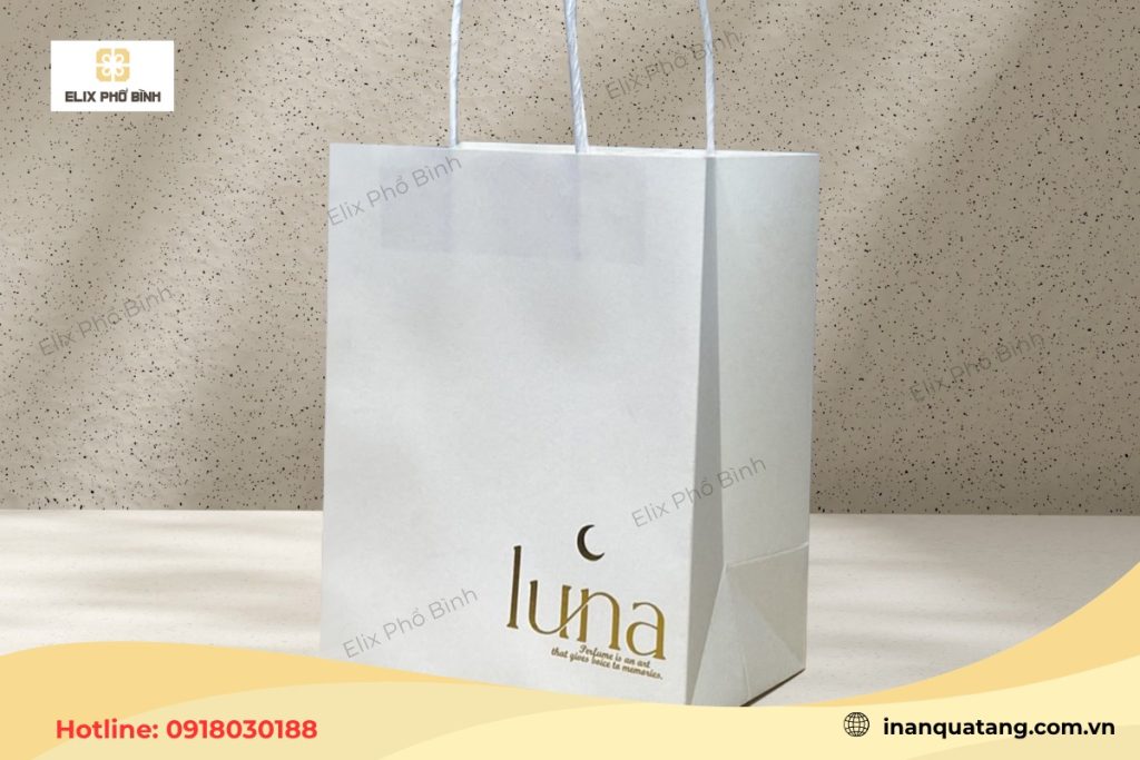 Mẫu túi giấy Ivory cứng cấp được in logo thương hiệu mỹ phẩm đơn giản